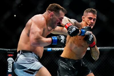 Dustin Poirier came through a brutal fight to beat Michael Chandler. AP