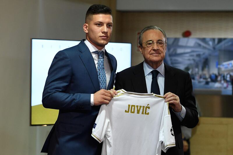 Luka Jovic poses with Real Madrid's president Florentino Perez at the Santiago Bernabeu stadium in Madrid on June 12, 2019 during his official presentation. AFP