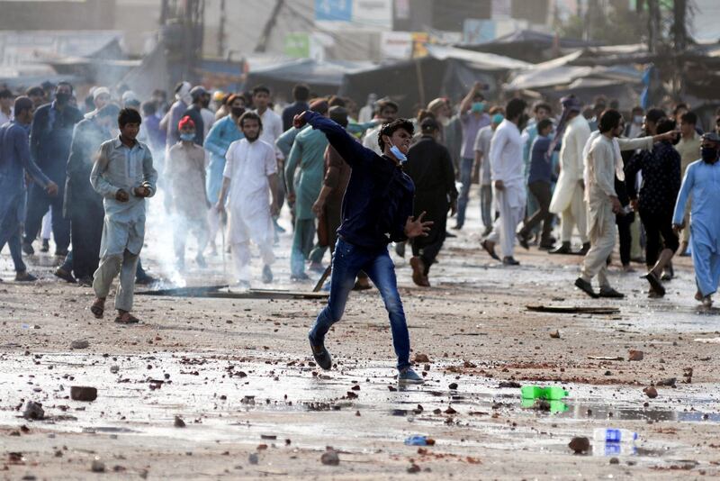 TLP supporters attacked police in Lahore. Reuters