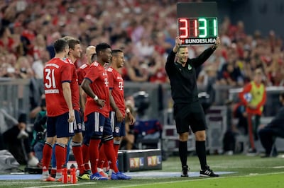 Bayern players wait for their substitution during farewell soccer match for Bastian Schweinsteiger between FC Bayern Munich and Chicago Fire in Munich, Germany, Tuesday, Aug. 28, 2018. (AP Photo/Matthias Schrader)