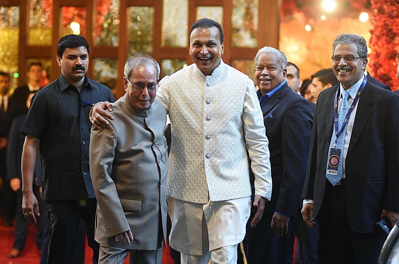 Former President of India and Indian businessman Anil Ambani attend the wedding. AFP