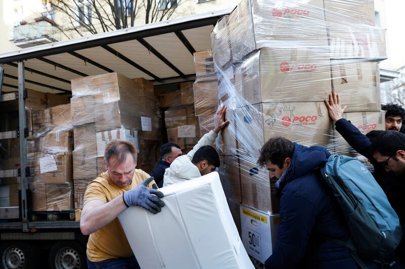 Members of the Turkish community in Berlin collect aid to support victims. Reuters
