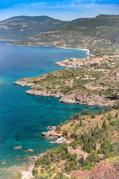 Kardamyli, Messenia, Peloponnese, Greece. Birdseye or elevated view of Kardamyli (transliterated as Kardamyle, Cardamyle, Kardamili, Kardhamili) is a village on the east coast of the Mani Peninsula on the aquamarine waters of the Messiniakos Gulf.