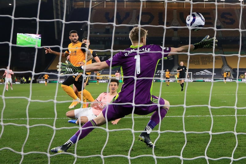 Wolverhampton Wanderers' Brazilian striker Willian José (centre left) scores the opening goal. AFP