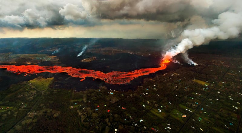 Lava from the Kilauea volcano flows in and around Pahoa, Hawaii. LE Baskow / AP Photo