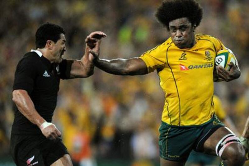 Radike Samo, right, scored Australia's second try in their defeat of New Zealand to win the Tri Nations for the first time in 10 years.