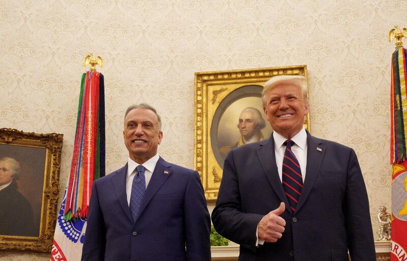 US President Donald Trump receives Iraq's Prime Minister Mustafa Al Kadhimi in the Oval Office at the White House in Washington, August 20, 2020. Reuters