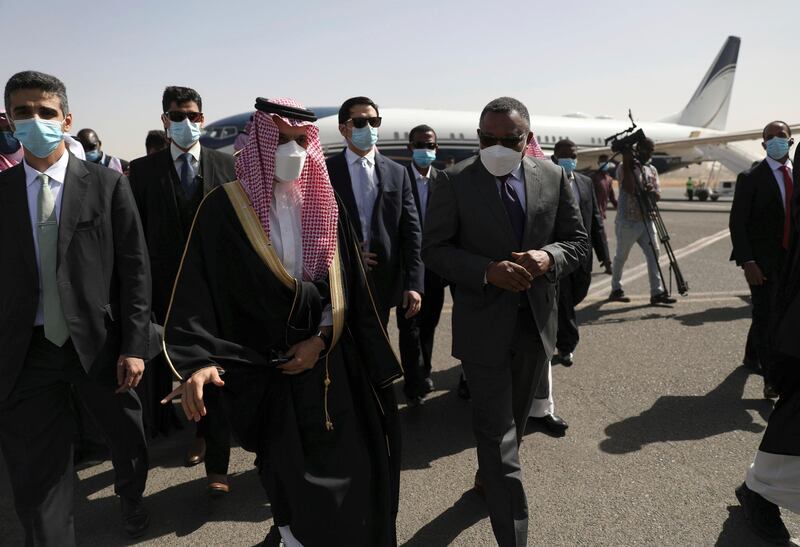 Sudanese acting Foreign Minister Omar Qamar al-Din, center right, welcomes Saudi Foreign Minister Prince Faisal bin Farhan, third on left, upon his arrival to Khartoum Airport. in Khartoum, Sudan, Tuesday, Dec. 8, 2020. The prince's visit is the first by the Kingdom's top diplomat since Sudan's military overthrew former autocratic leader President Omar al-Bashir last year. (AP Photo / Marwan Ali)