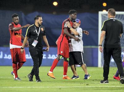 Diego Maradona embraces one of his players after the President's Cup quarter-final. Pawan Singh / The National