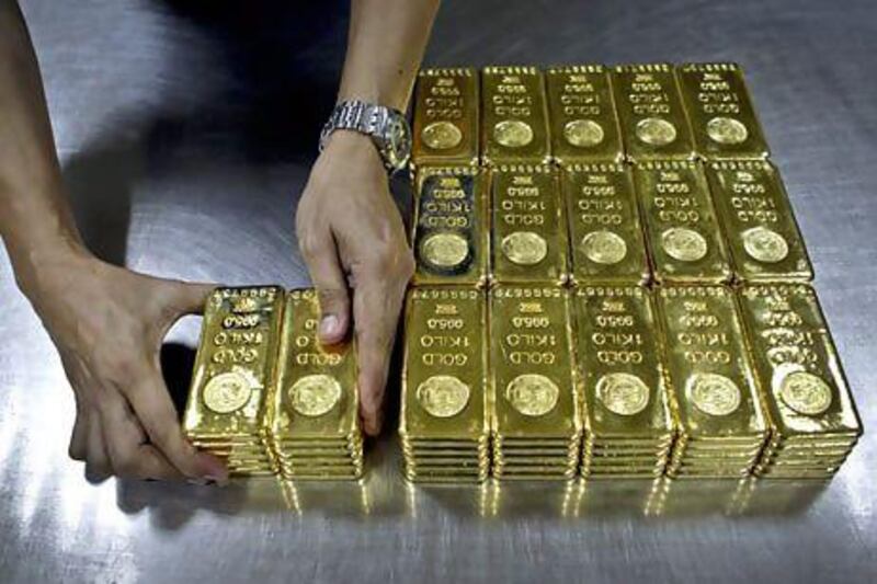 Physical gold from Dubai has been selling strongly since the price of the yellow metal first plunged in April. Kamran Jebreili / AP Photo