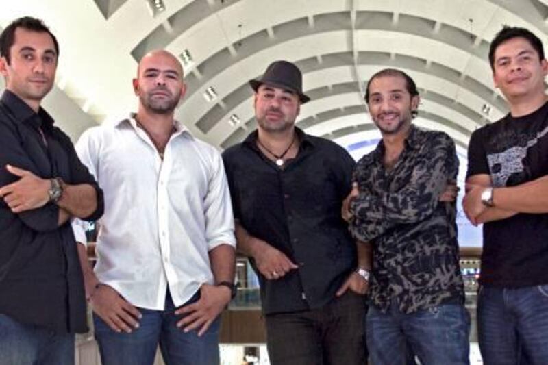 Dubai - September 29, 2011- From left drummer Ashraf Helmi, percussionist Adham Sharkawy, guitarists and vocalists Sharif Maghraby and Majed Fassi and bassist Gabriel Matute make up the band Dahab in Dubai, September 29, 2011. (Photo by Jeff Topping/The National) 

 