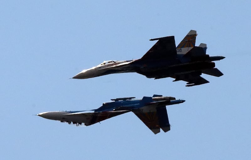 Russian SU-27 aircraft perform at the International Maritime Defence Show in St Petersburg, Russia, in July 2013. EPA