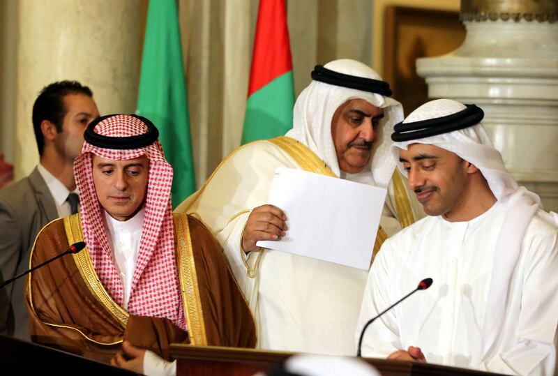 Sheikh Abdullah bin Zayed, The UAE Minister for Foreign Affairs and International Cooperation, right, the Saudi foreign minister Adel Al Jubeir, left, an  the Bahrain foreign minister Khalid bin Ahmed Al Khalifa attend a press conference after their meeting that discussed the diplomatic situation with Qatar, in Cairo on July 5. Khaled Elfiqi / Reuters