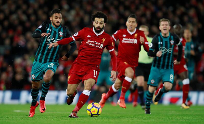 Soccer Football - Premier League - Liverpool vs Southampton - Anfield, Liverpool, Britain - November 18, 2017   Liverpool's Mohamed Salah in action with Southampton's Sofiane Boufal     Action Images via Reuters/Jason Cairnduff    EDITORIAL USE ONLY. No use with unauthorized audio, video, data, fixture lists, club/league logos or "live" services. Online in-match use limited to 75 images, no video emulation. No use in betting, games or single club/league/player publications. Please contact your account representative for further details.