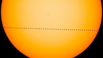 In this composite image provided by NASA, the planet Mercury passes directly between the sun and Earth on May 9, 2016 in a transit which lasted seven-and-a-half-hours. On Monday, Nov. 11, 2019, Mercury will make another transit, visible from the eastern U.S. and Canada, and all Central and South America. The rest of North America, Europe and Africa will catch part of the action. Asia and Australia will miss out. (NASA's Goddard Space Flight Center/SDO/Genna Duberstein via AP)