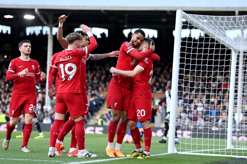 Diogo Jota of Liverpool celebrates with Cody Gakpo after scoring his team's third. Getty Images