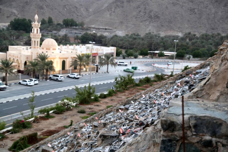 Sharjah, United Arab Emirates - September 24, 2018: A waterfall. Neighbourhood watch series. Wadi Al Helo town also known as sweet valley. Residents talking about the town, archaeological site and the valley. Monday, September 24th, 2018 at Wadi Al Helo, Sharjah. Chris Whiteoak / The National