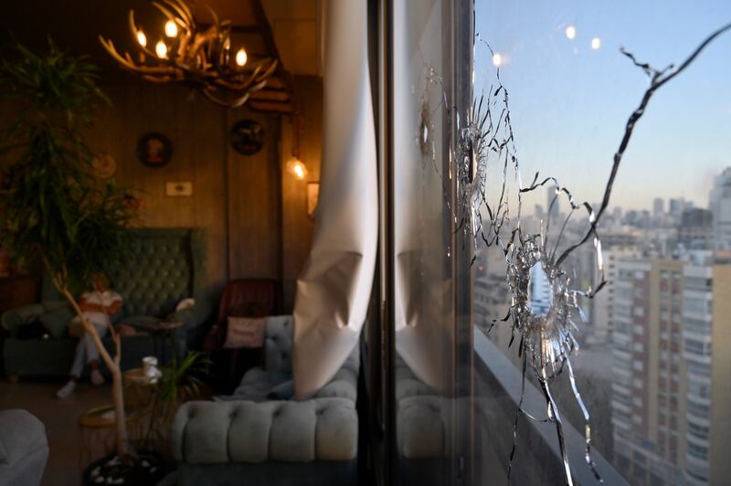 Bullet holes in a window a day after clashes in the Tayouneh area of Beirut, Lebanon. EPA