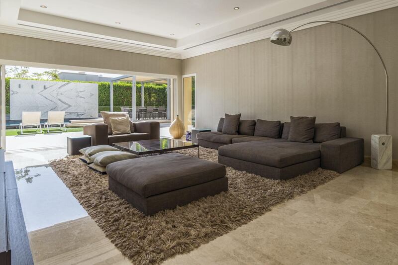 The lounge leads straight out into the garden. Courtesy LuxuryProperty.com