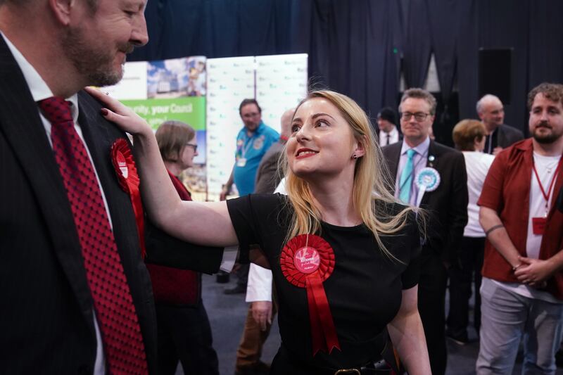 Labour Party candidate Gen Kitchen celebrates with Labour MP for Chesterfield Toby Perkins after being declared winner in the Wellingborough by-election. PA