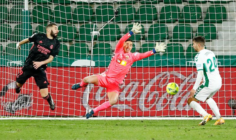 Real Madrid's Karim Benzema shoots at goal. Reuters