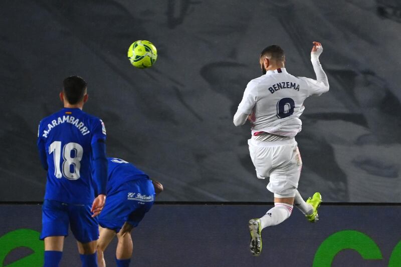 Real forward Karim Benzema scores their opening goal. AFP