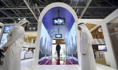 Dubai, 08, Oct, 2017 : Visitors take a look at the new Smart Tunnel at the  Dubai Naturalization and Residency stand during the  37th Gitex Technology Week at the World Trade Centre in Dubai. Satish Kumar / For the National