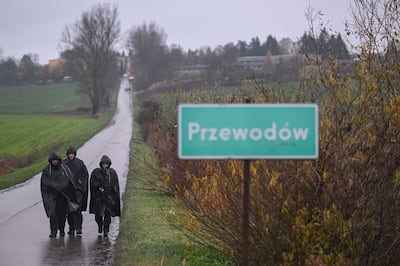 Police patrol a blast site in Przewodow, where a stray Russian missile struck in November, killing two people. Getty