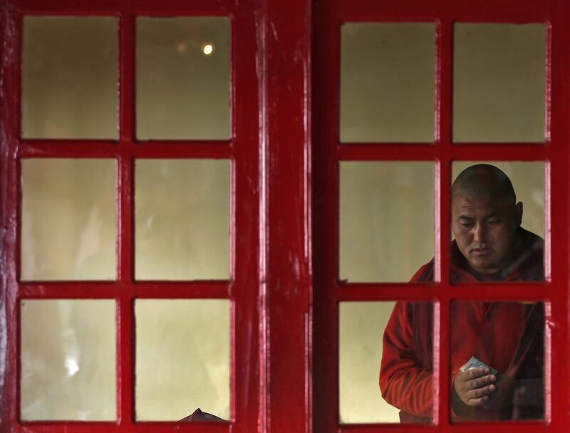 A Buddhist monk is seen inside a restaurant in Ladakh. The Buddhist-dominated Ladakh region stands at a height of 3,505 meters (11,499 feet) and is famous among tourists for its monasteries, landscapes, mountains and rich cultural heritage. Ahmad Masood / Reuters