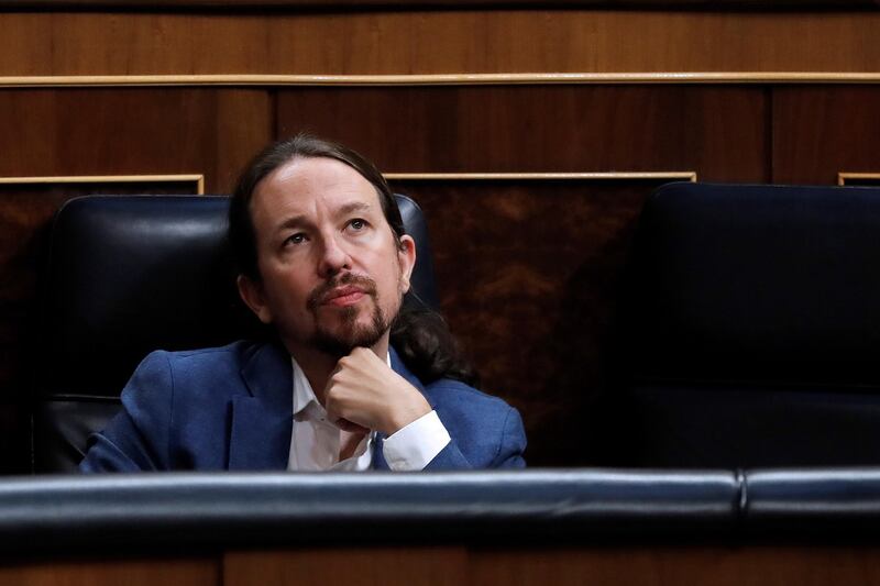 epa08559738 Spanish Second Deputy Prime Minister Pablo Iglesias attends a Government Question Time Session held in the framework of a plenary session at Congress of Deputies in Madrid, Spain, 22 July 2020. The MPs debate and vote the final report of the Commission for Social and Economic Reconstruction that will lay the foundations of measures for mitigating the effects of the coronavirus pandemic.  EPA/CHEMA MOYA