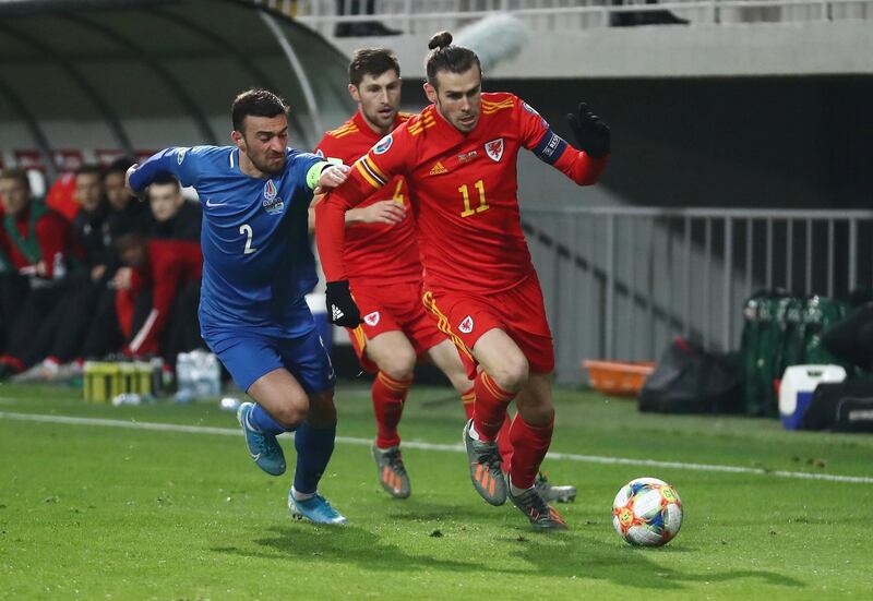 Gareth Bale in action with Azerbaijan's Gara Garayev. Reuters