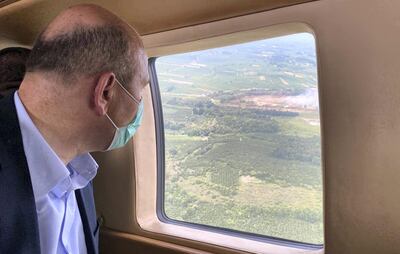 Turkish Interior Minister Suleyman Soylu looks out from his helicopter as he flies over the firework factory following a blast in Hendek in Sakarya province, Turkey, July 3, 2020. Turkish Interior Ministry/Handout via REUTERS ATTENTION EDITORS - THIS PICTURE WAS PROVIDED BY A THIRD PARTY. NO RESALES. NO ARCHIVE
