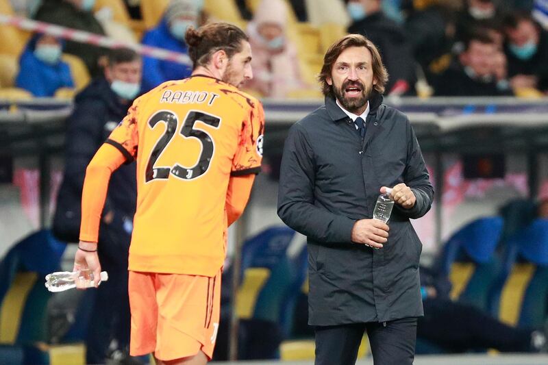 Juventus manager Andrea Pirlo gives instructions to Adrien Rabiot. AP
