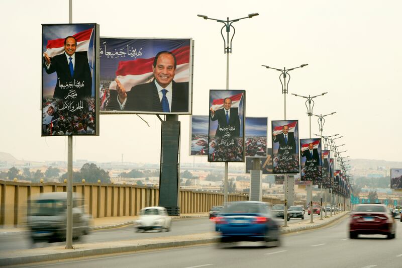 Egyptian President Abdel Fattah El Sisi, whose government is under fire over an ailing economy, appears on billboards in Cairo. AP