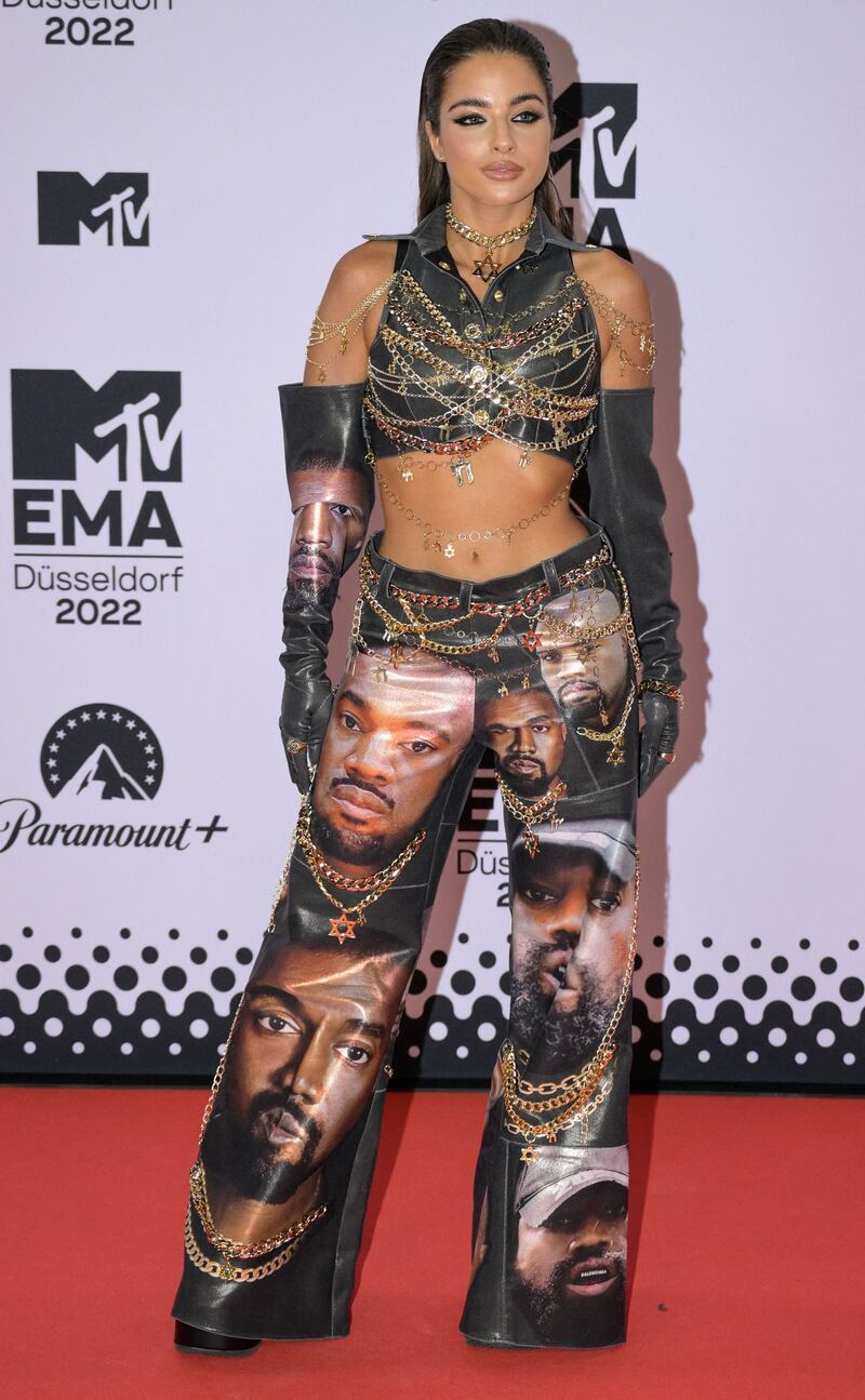 Singer Noa Kirel wearing a crop top with Kanye West-printed trousers by Yuval Alroey. AFP 