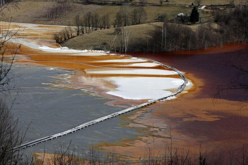 A polluted lake, tainted with cyanide and other chemicals. Bogdan Cristel / Reuters