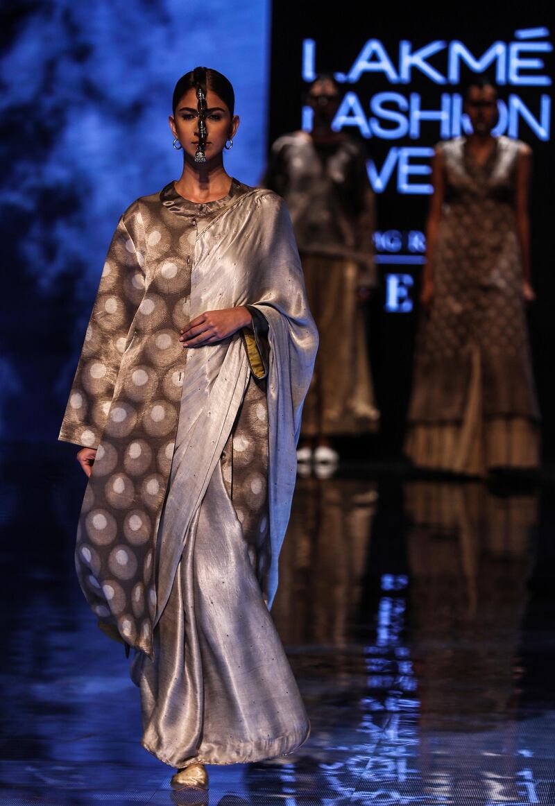 epa07785747 A model presents a creation by fashion brand store Aavaran Udaipur during the Lakme Fashion Week (LFW) Winter/Festive 2019 in Mumbai, India, 22 August 2019. More than 75 designers are showcasing their collections at the event until 25 August.  EPA/DIVYAKANT SOLANKI