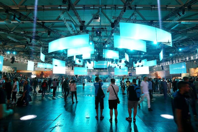 Visitors try out Electronic Arts at Gamescom. Mathis Wienand / Getty