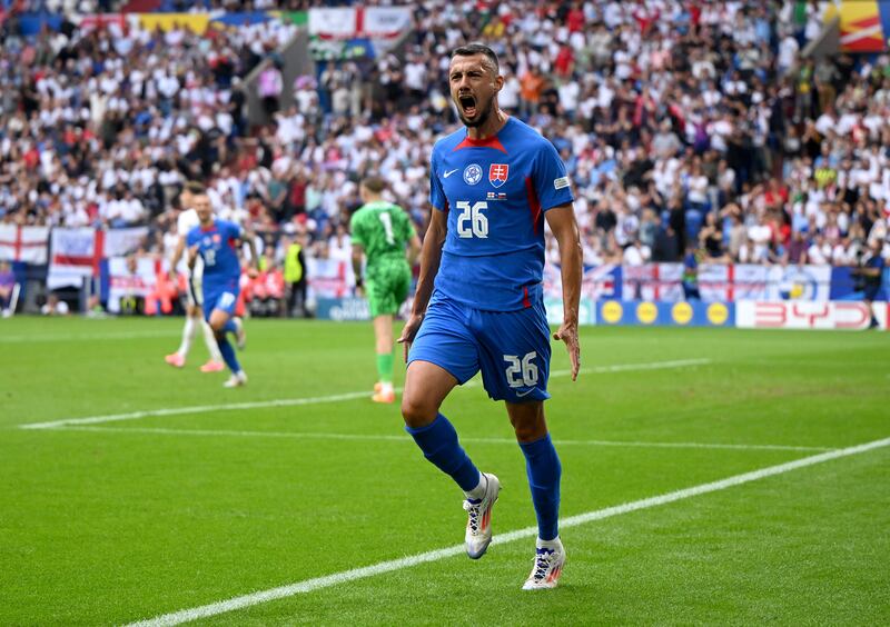 Ivan Schranz of Slovakia celebrates scoring his team's first goal. Getty Images