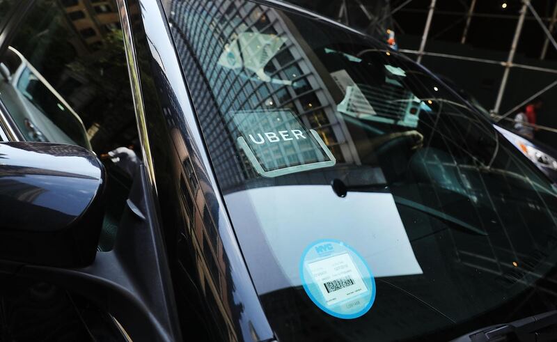 NEW YORK, NY - JUNE 14:  An Uber car waits for a client in Manhattan a day after it was announced that Uber co-founder Travis Kalanick will take a leave of absence as chief executive on June 14, 2017 in New York City. The move came after former attorney general Eric H. Holder Jr. and his law firm, Covington & Burling, released 13 pages of recommendations compiled as part of an investigation of sexual harassment at the ride-hailing car service.  (Photo by Spencer Platt/Getty Images)