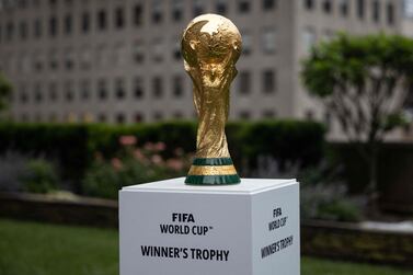 The FIFA World Cup trophy is displayed during an event in New York after an announcement related to the staging of the FIFA World Cup 2026, on June 16, 2022.  - Mexico City's iconic Azteca Stadium and the Los Angeles Rams' multi-billion-dollar SoFi Stadium were among 16 venues named on June 16 to stage games at the 2026 World Cup being held in the United States, Canada and Mexico.  (Photo by Yuki IWAMURA  /  AFP)