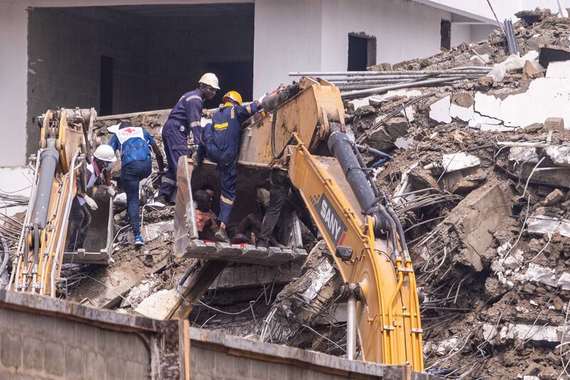 Nigerian rescue crews pulled two more survivors and were communicating with others buried inside the rubble, a day after the disaster. AFP