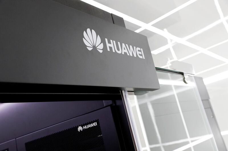 Logos of Huawei are seen on a device at its showroom in Shenzhen, Guangdong province, China March 29, 2019. REUTERS/Tyrone Siu