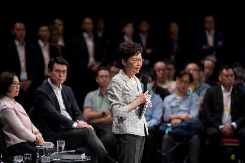 Carrie Lam, Hong Kong's chief executive, speaks during a Community Dialogue session at Queen Elizabeth Stadium in the Wan Chai district on Hong Kong, China, on Thursday, Sept. 26, 2019. The public dialogue is the latest step in an effort to assuage pro-democracy protesters ahead of expected large-scale demonstrations on the Oct. 1 anniversary of Communist rule in China. Photographer: Paul Yeung/Bloomberg