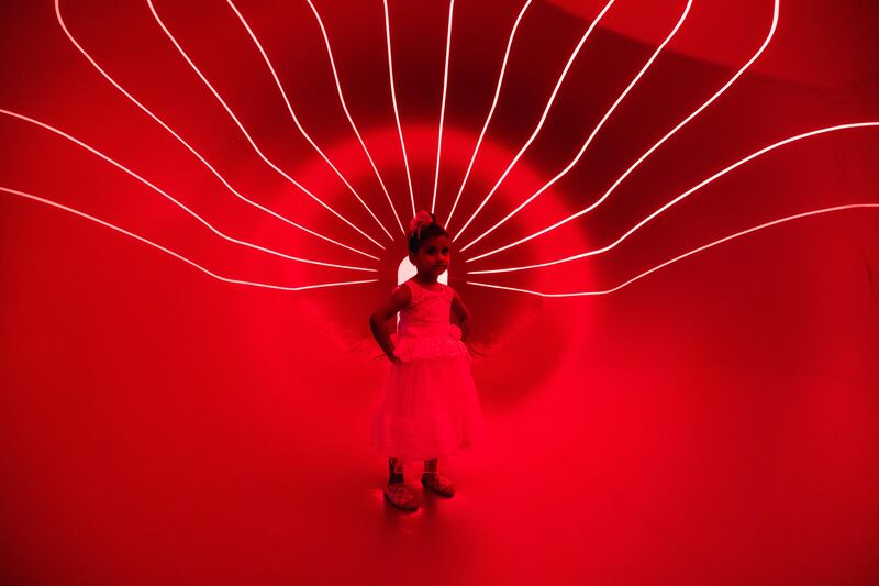 A child inside Dodecalis Luminarium, an immersive art installation by Architects of Air, at Expo 2020 Dubai's Festival Garden. Photo: Expo