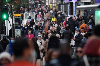 Shoppers walk after new nationwide restrictions were announced during the coronavirus disease (COVID-19) outbreak in Oxford Street, London, Britain, November 2, 2020