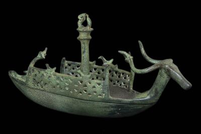 A bronze 'navicella' boat figurine from Sardinia, circa 1000 BC to 700 BC, is one of more than 200 artefacts from the Italian island, Cyprus and Crete to go on display at the exhibition. PA