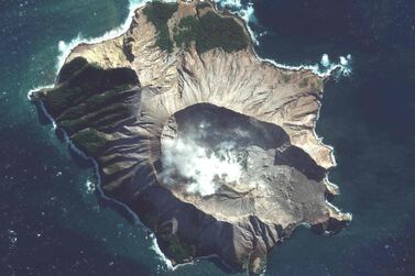 This handout image courtesy of Satellite image ��2019 Maxar Technologies, shows the White Island volcano in New Zealand on May 12, 2019. The smouldering New Zealand volcano that killed at least six people is still too dangerous for emergency teams to recover bodies from, police said Wednesday, warning that many tourists who escaped the island were so badly burned they were not yet out of danger. - XGTY / RESTRICTED TO EDITORIAL USE - MANDATORY CREDIT "AFP PHOTO / SATELLITE IMAGE ��2019 MAXAR TECHNOLOGIES" - NO MARKETING NO ADVERTISING CAMPAIGNS - DISTRIBUTED AS A SERVICE TO CLIENTS --- The watermark may not be removed/cropped / AFP / Satellite image ��2019 Maxar Technologies / HO / XGTY / RESTRICTED TO EDITORIAL USE - MANDATORY CREDIT "AFP PHOTO / SATELLITE IMAGE ��2019 MAXAR TECHNOLOGIES" - NO MARKETING NO ADVERTISING CAMPAIGNS - DISTRIBUTED AS A SERVICE TO CLIENTS --- The watermark may not be removed/cropped
