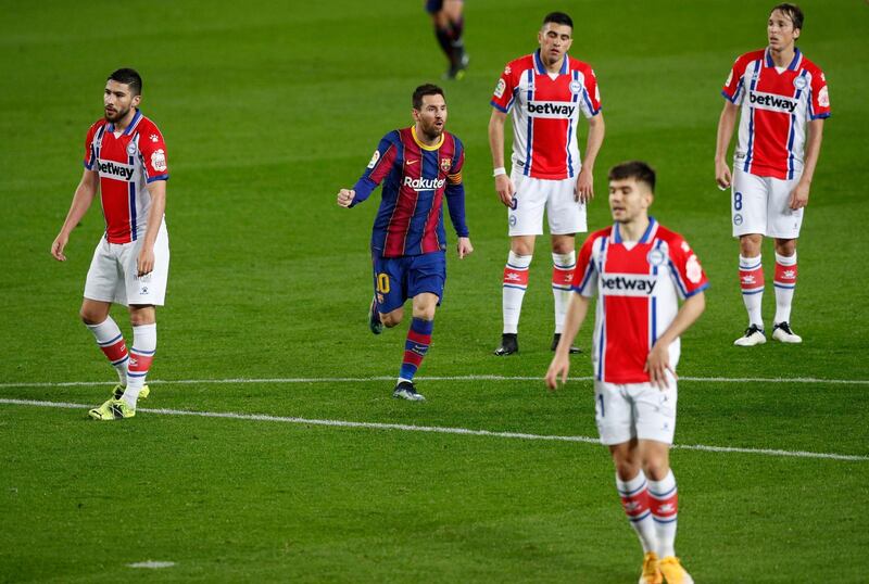 Barcelona's Lionel Messi celebrates scoring their second goal. Reuters