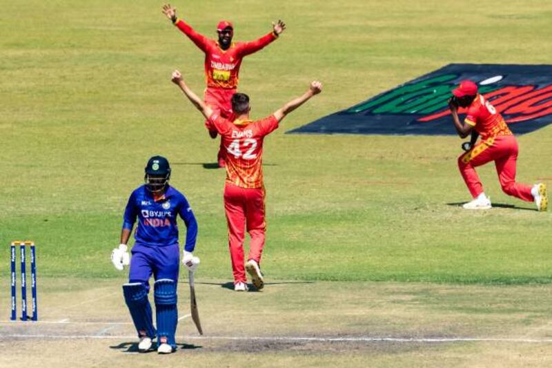 Zimbabwe's Sikandar Raza celebrates with Brad Evans after he picked up five wickets. Getty